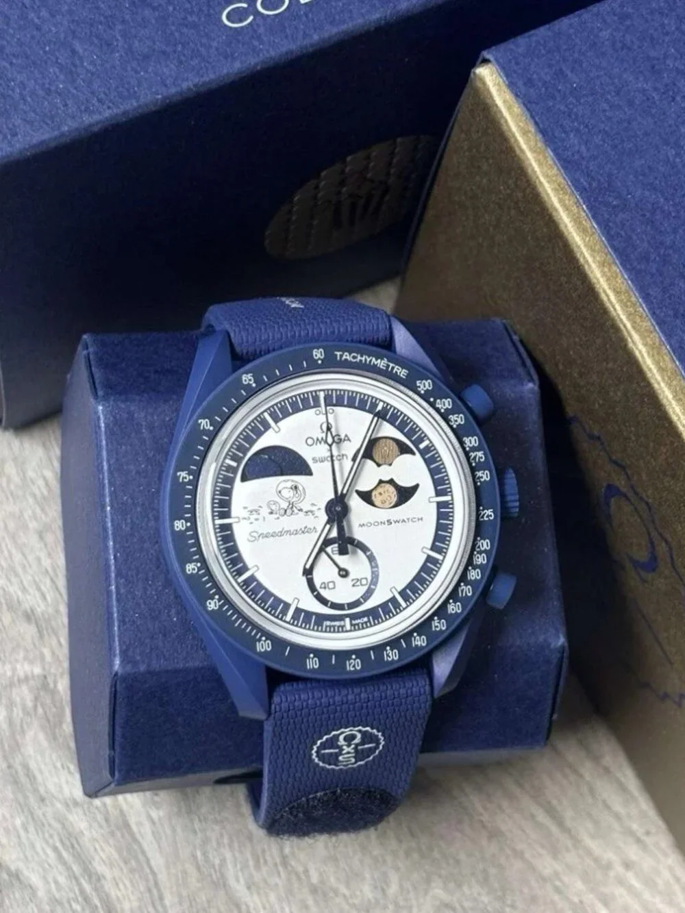 Omega x Swatch Mission to EarthPhase Moonshine Gold Snoopy Blue